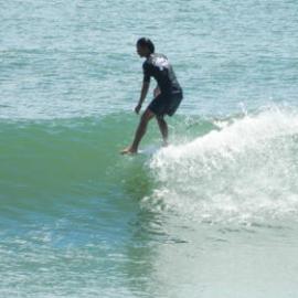 Competitor, Noosa Festival of Surfing, Noosa Main Beach, Noosa Heads, 14 March 2013