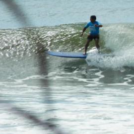 Competitor, Noosa Festival of Surfing, Noosa Main Beach, Noosa Heads, 14 March 2013