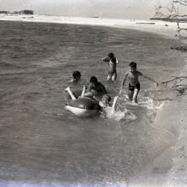 Enjoying a dip, Jones family, Pincushion Island, Cotton Tree, ca 1950s