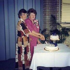 Cutting the cake, Mrs Beryl Wells and Mrs Dorothy Mathison, QCWA 50 Years Celebrations, 1995