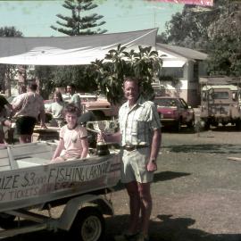 David (in boat) and Peter Riley, 1st prize winner, inaugural Fishing Competition, Noosaville, 1983