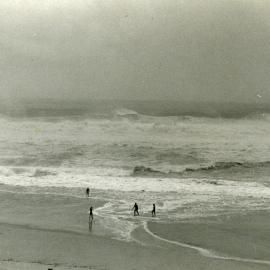 Beachgoers and storm surge, Cyclone Cliff, Noosa Main Beach, Noosa Heads, February 1981