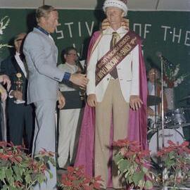 George Fewtrell crowned 'King of the Mountain', Festival of Waters Ball, Cooroy Memorial Hall, Cooroy, 1 September 1979