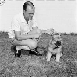 Tom Wagner and 'Captain', Mon Caprise Fashions, Noosa River Shopping Centre, Cnr Gympie Terrace and Thomas Street, Noosaville, January 1972
