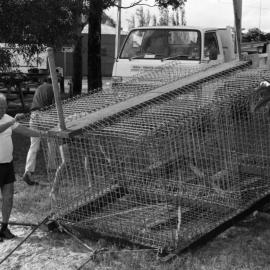Bill Mayne receiving a seafood create, Noosaville, ca 1982