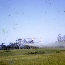 Crop dusting, Cooroy-Tewantin Road, Cooroy, 1970s