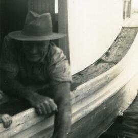 John Clarey aboard the 'Marianne', Noosa River, Tewantin, ca 1956