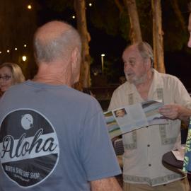 Dennis Lewis (holding brochure), Michael Court (floral shirt) and attendees, Noosa's Surfing History: In Conversation, The J, Noosa Heads, 11 March 2025