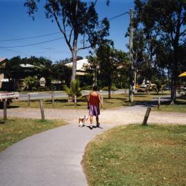 Walking the dog, Pete the Pelican, Pelican Boat Hire, 180 Gympie Terrace, Noosaville, 1990s