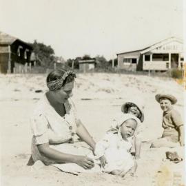 Norma Gardman with daughter Glenise Clelland (baby), Noosa Main Beach, ca 1941