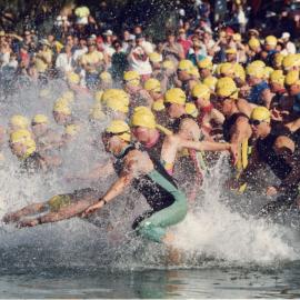Competitors, swim leg, Noosa Triathlon, Noosa Heads, 1980s
