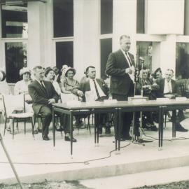 David Low MLA (at microphone) and dignitaries, official opening, Peregian Roadhouse, Peregian Beach, 2 June 1962