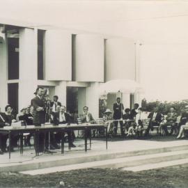 Mr D.R. O'Leary (at microphone) and dignitaries, official opening, Peregian Roadhouse, Peregian Beach, 2 June 1962