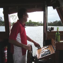 At the helm, Hugh Ramsay, 'Riva Minx', Noosa River, Noosaville, 5 November 2011