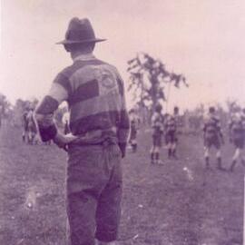 Bob Chapple watching Cootharaba Football Team, Cootharaba Sportsground, Cootharaba, early 1920s