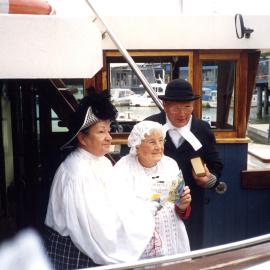 Costumed ferry travellers, Noosa Marina, Tewantin, 2001