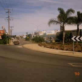 Businesses, round-a-bout, Noosa Drive and Sunsine Beach Road, Noosa Junction, Noosa Heads, 6 March 1990