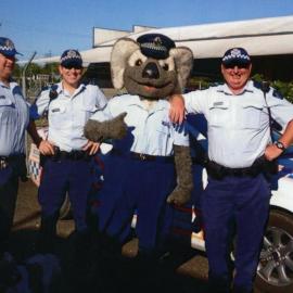 Sergeant Mal Scott, unknown officer, Senior Constable Clancy the Koala and unknown officer (l-r), Cooroy