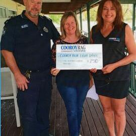 Sergeant Mal Scott and Cooroy Ray staff, financial support cheque presentation, Cooroy, ca June 2022