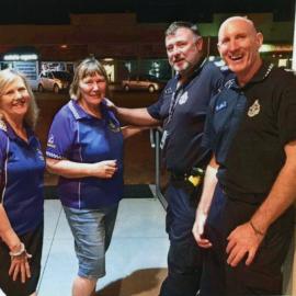 Sergeant Mal Scott (2nd right), unknown police officer (1st right) and Blue Light Disco volunteers, Cooroy Memorial Hall, Cooroy, ca 2020 