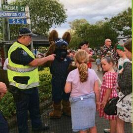 Sergeant Mal Scott (l) with 'Cluedo', community event, Cooroy