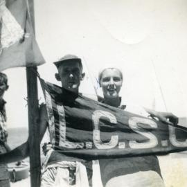 Ken and Laureen, Lake Cootharaba Sailing Club burgee, ca 1950s