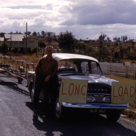 A long load, Clubhouse construction, Lake Cootharaba Sailing Club members, ca 1960