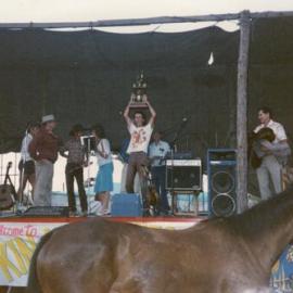 Gavin Elliott with trophy, Great Kin Kin Horse Race, Kin Kin, ca 1986-88