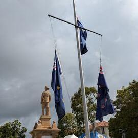 Cenotaph and flags, ANZAC Day service, Tewantin, 25 April 2026