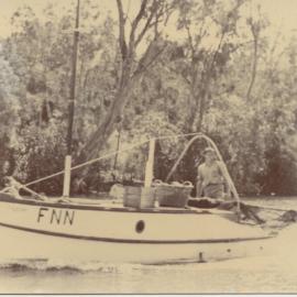 Kevin Clarey onboard 'Victory', Noosa River, 1966