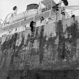 Climbing aboard the grounded Cherry Venture, August 1973 