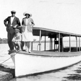 Jack Parkyn with his motor launch 'Miss Tewantin', Noosa River bank, Tewantin 