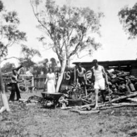 Chopping firewood, Munna Point, Noosaville 