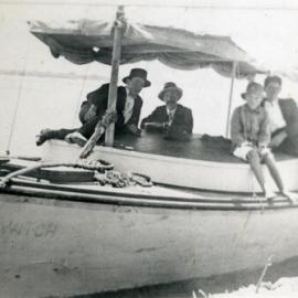 Eric Abraham, Herbert Arundell, Chas. Martin Jnr  and Claude Arundell (left to right) onboard 'Water Witch',   Tewantin, ca 1914