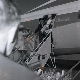 Disembarking first flight, East West Airlines, Maroochy Airport, 19 December 1970