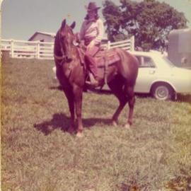 Claudia Hofmann astride a horse, Weyba Ranch, Sunset Drive, Noosa Heads