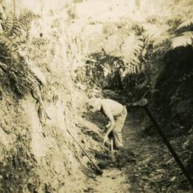 Ernie Greber digging out gully ready for pipes, 'Noosa Vale', Noosa Heads, 18 July 1949