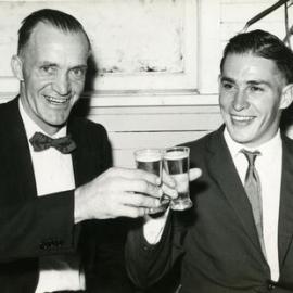 Cheers, Bernie O'Leary and Jim Lowe (l-r), 21st birthday celebrations, Tewantin-Noosa RSL Hall, Tewantin, 23 May 1963