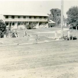 Noosiana flats and early days of construction, Sunny Snaps Studios, Hastings Street, Noosa Heads, April 1957