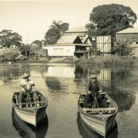 Arthur Ronlund (R) and possibly Victor Ronlund in manual propulsion boats built by Arthur, Noosa River, Tewantin, ca 1930s