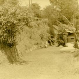 Elissa Freeman, driveway, 'Driftwood', Morwong Drive, Noosa Heads, 24 October 1967