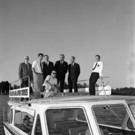 Wally Rae, Minister for Local Government, and visitors aboard the Cooloola Queen (Everglades Tours), Parkyn Boat Wharf, Tewantin, 21 June 1971