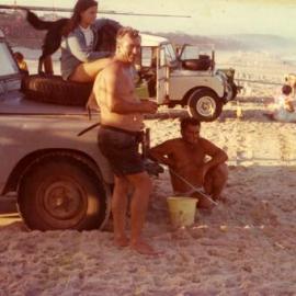 Beach fishing party. ca 1970