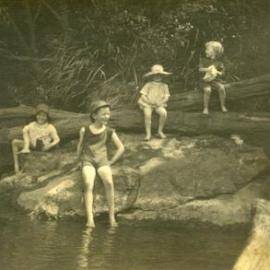 Cooling off beside the river, ca 1920s