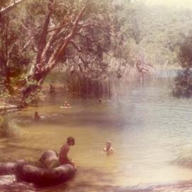 Cooling off and time for a swing, ca 1970