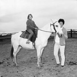 Donna Hofmann (holding reins) and possibly Claudia or Linda Hofmann, Weyba Ranch, Sunset Drive, Noosa Heads, June 1972