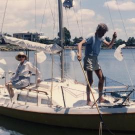 Emma and Kevin Freeman aboard 'Penguin', Noosa Woods, Noosa Heads, 3 November 1988