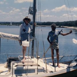 Emma and Kevin Freeman aboard 'Penguin', Noosa Woods, Noosa Heads, 3 November 1989