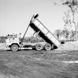 Dump truck, land development, Weyba Creek,  Noosaville,  23 August 1972